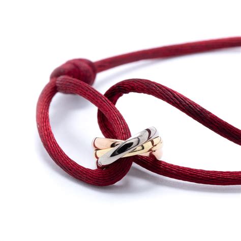 silk cord bracelet cartier|cartier trinity bracelet meaning.